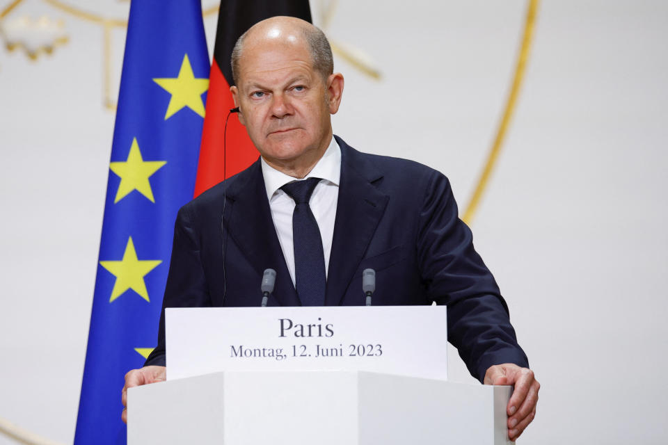 German Chancellor Olaf Scholz speaks during a joint press conference with French President Emmanuel Macron and Polish President Andrzej Duda, Monday, June 12, 2023 at the Elysee palace in Paris. Emmanuel Macron, German Chancellor Olaf Scholz and Polish President Andrzej Duda meet in Paris for talks focusing on military support for Ukraine's counteroffensive and future security guarantees to be given to the country, ahead of a NATO summit in July. (Sarah Meyssonnier , Pool via AP)