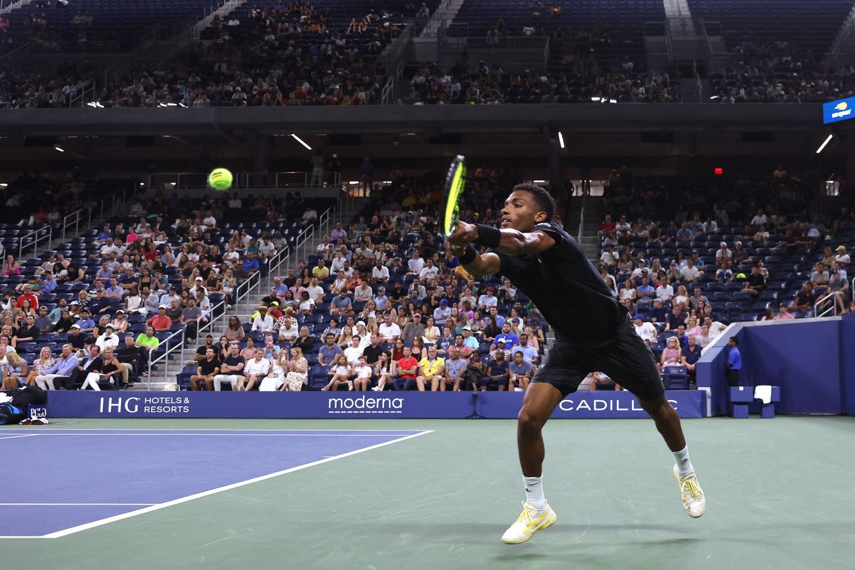 Felix Auger Aliassime of Canada misses a return shot against Jack Draper of Great Britain in their Men's Singles Second Round match on Day Three of the 2022 U.S. Open at USTA Billie Jean King National Tennis Center on Aug. 31, 2022, in Flushing, Queens.