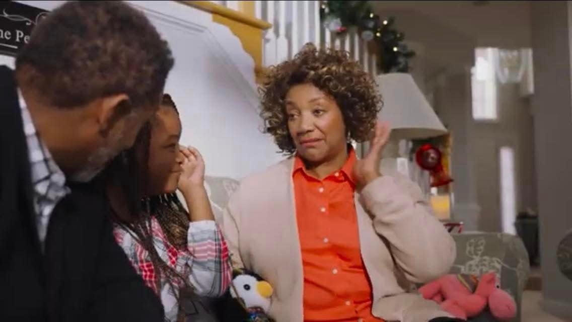 A screenshot of "The Perfect Christmas" movie which stars Petersburg native Belinda Todd as Rosalina the grandmother. Actors from left to right, Cameron Arnett, Amirah Hackett and Belinda Todd..