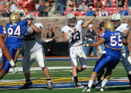 DALLAS, TX - DECEMBER 30: Riley Nelson #13 of the Brigham Young Cougars throws against the Brigham Young Cougars during the Bell Helicopter Armed Forces Bowl at Gerald J. Ford Stadium on December 30, 2011 in Dallas, Texas. (Photo by Ronald Martinez/Getty Images)