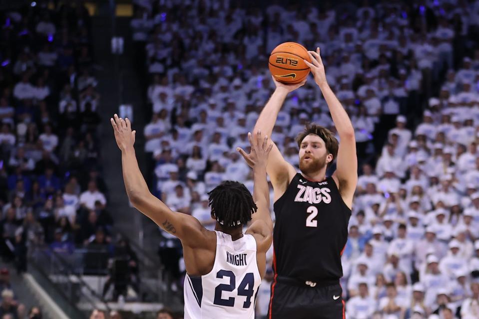 Gonzaga forward Drew Timme (2) shoots against Brigham Young forward Seneca Knight (24) in the first half at Marriott Center.