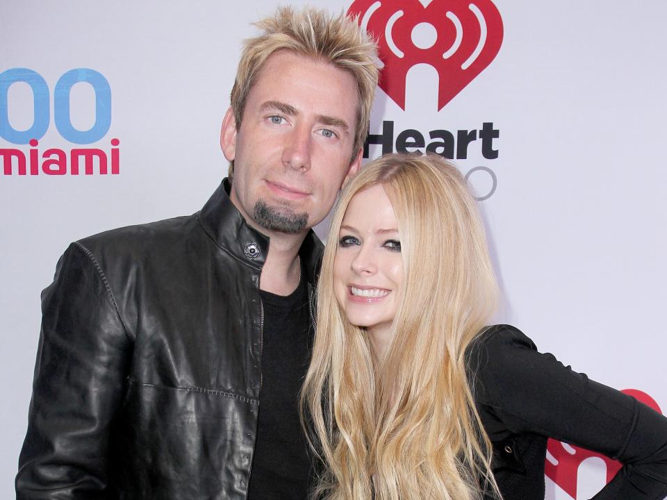 Chad Kroeger (L) and Avril Lavigne attend Y100’s Jingle Ball 2013 Presented by Jam Audio Collection at BB&T Center on December 20, 2013 in Miami, Florida