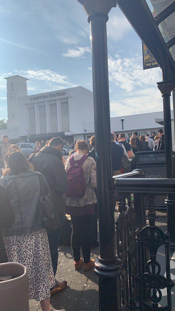 People queuing to access Surbiton station on Tuesday morning (Olivia Nihad/@OliviaNihad/Twitter)