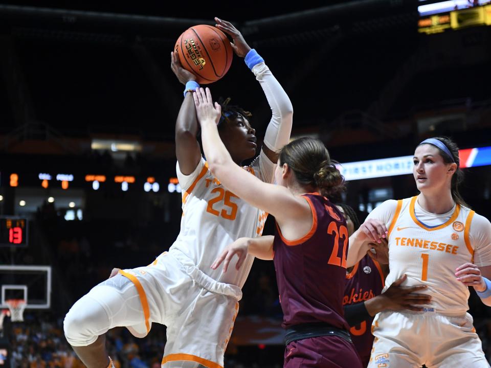 Tennessee guard Jordan Horston (25) shoots and scores over Virginia Tech guard Cayla King (22) during the NCAA college basketball game between the Tennessee Lady Vols and Virginia Tech Hokies in Knoxville, Tenn. on Sunday, December 4, 2022. 