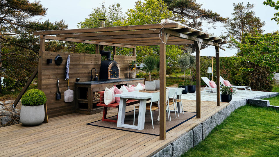 We've got outdoor kitchen ideas to suit any style of plot – from sleek worktops and built-in grills to colorful tiles and rustic looks