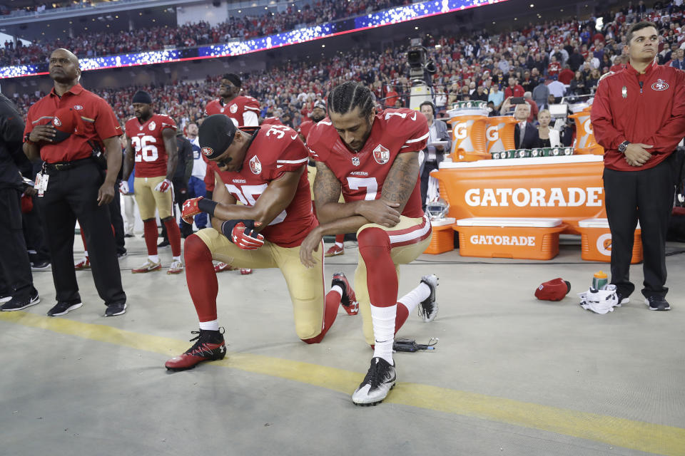 FILE - In this Sept. 12, 2016, file photo, San Francisco 49ers safety Eric Reid (35) and quarterback Colin Kaepernick (7) kneel during the national anthem before an NFL football game against the Los Angeles Rams in Santa Clara, Calif. When Colin Kaepernick took a knee during the national anthem to take a stand against police brutality, racial injustice and social inequality, he was vilified by people who considered it an offense against the country, the flag and the military. Nearly four years later, it seems more people are starting to side with Kaepernick’s peaceful protest and now are calling out those who don’t understand the intent behind his action. (AP Photo/Marcio Jose Sanchez, File)