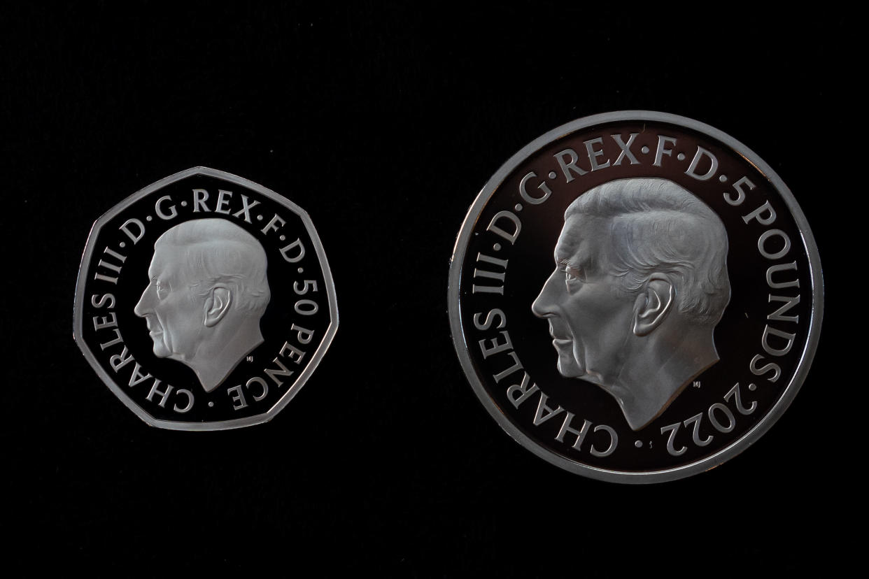 The official coin effigy of King Charles III on a 50 pence and �5 Crown commemorating the life and legacy of Queen Elizabeth II, during an announcement regarding the designs for the new coins and notes depicting King Charles III at the Worshipful Company Of Cutlers, at Cutlers' Hall, London. Picture date: Thursday September 29, 2022.