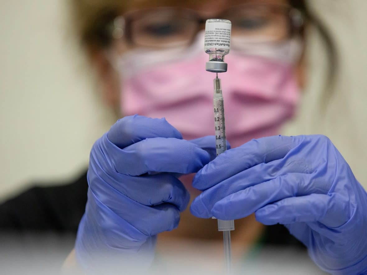 More Saskatchewan residents are now eligible for their third dose of a COVID-19 vaccine, provided it's been five months since their second shot. (Emily Elconin/Reuters - image credit)