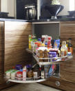 <p> &apos;Traditional kitchen corner cabinets can be notoriously difficult to access and store items in, but there are solutions available, such as racks that slide along and out when the door is opened. This simple addition utilizes all available space and makes the kitchen more user-friendly,&apos; says Daniela Condo.&#xA0; </p> <p> &apos;Pull-out kitchen cupboard storage ideas are also highly efficient and perfect for tidying away herbs and condiments, whilst the pull-down option offers greater accessibility for those with high set cabinetry.&apos; </p>