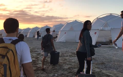 The festival-goers arrive at the island accommodation - Credit: Netflix