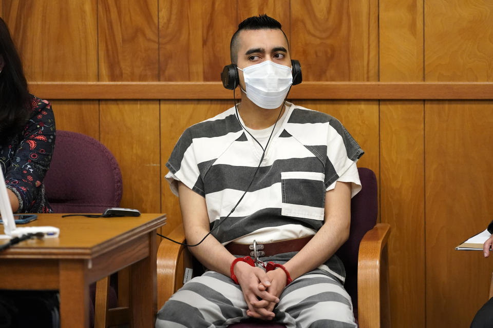 Cristhian Bahena Rivera listens to proceedings during his sentencing, Monday, Aug. 30, 2021, at the Poweshiek County Courthouse in Montezuma, Iowa. Rivera was sentenced to life in prison for the stabbing death of college student Mollie Tibbetts, who was abducted as she was out for a run near her small eastern Iowa hometown in July of 2018. (AP Photo/Charlie Neibergall, pool)