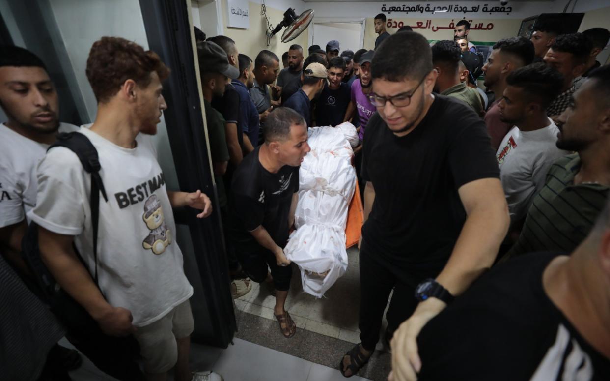 Dead Palestinians are brought to Al Avde hospital