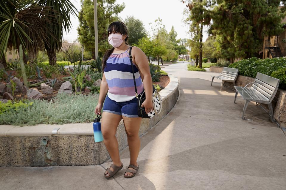 Arizona State University political science major Betzabel Ayala poses for a photo on campus Tuesday, Sept. 8, 2020, in Tempe, Ariz. Because of the coronavirus, Ayala is one of hundreds of thousands of off-campus U.S. college students who are being counted for the 2020 census at their parents' homes or other locations when they were supposed to be counted where they go to school. (AP Photo/Ross D. Franklin)