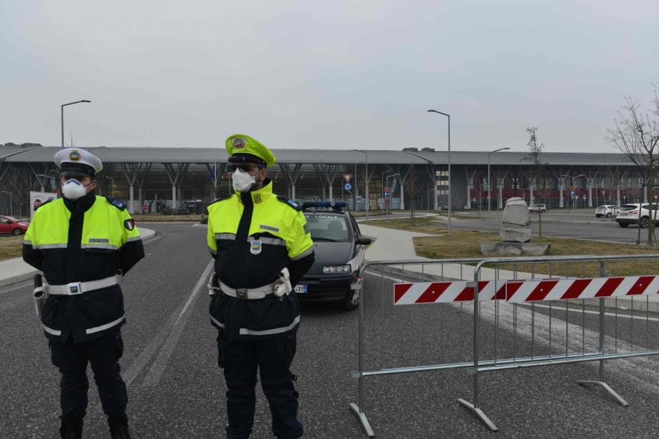 Police officers block access to Schiavonia hospital in Monselice, near Venice (AFP via Getty Images)