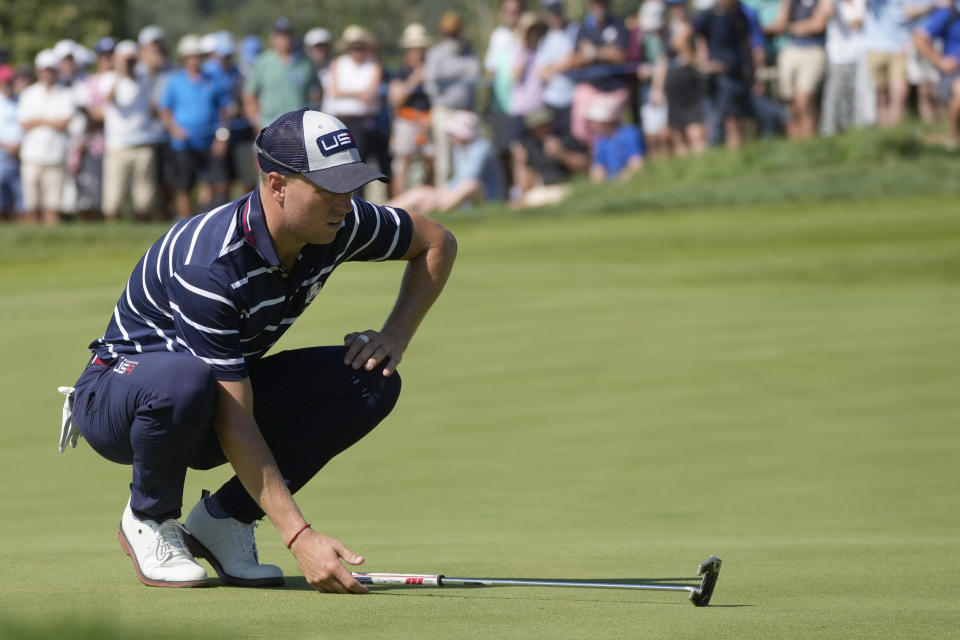 United States' Justin Thomas looks at the lie of his putt on the 3rd green during his afternoon Fourballs match at the Ryder Cup golf tournament at the Marco Simone Golf Club in Guidonia Montecelio, Italy, Friday, Sept. 29, 2023. (AP Photo/Gregorio Borgia )