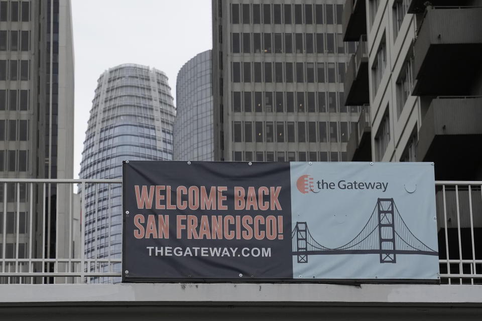 A weclome banner hangs on a walkway near the Embarcadero in San Francisco, Wednesday, Oct. 25, 2023. Thousands of CEOs, press, world leaders, protesters and others will descend on San Francisco for a global trade summit that could give the much maligned city a chance to shine. The annual Asia-Pacific Economic Cooperation leaders' summit could reverse San Francisco's image as a former economic powerhouse now in urban decline. (AP Photo/Eric Risberg)