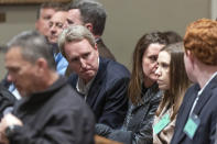 John Marvin Murdaugh looks over to his family before opening statements in his brother Alex Murdaugh's double murder trial at the Colleton County Courthouse in Walterboro, S.C, Wednesday, Jan. 25, 2023. (Joshua Boucher/The State via AP)