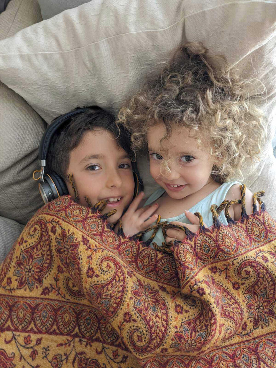 This undated photo provided by Rachel Gur shows Naveh Shoham and Yahel Shoham, ages 8 and 3. They are believed to have been taken hostage in Gaza in the wake of the Hamas attack on Kibbutz Be'eri. (Rachel Gur via AP)