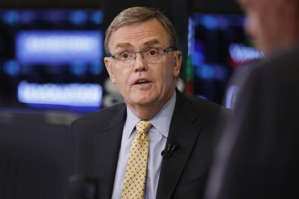 FILE - In this Sept. 14, 2018, file photo United Parcel Service Chairman and CEO David Abney is interviewed on the floor of the New York Stock Exchange. Abney spoke recently with The Associated Press about the peak delivery season, the growth in online shopping, and the company’s foray into making deliveries with drones. The comments are edited for brevity. (AP Photo/Richard Drew, File)