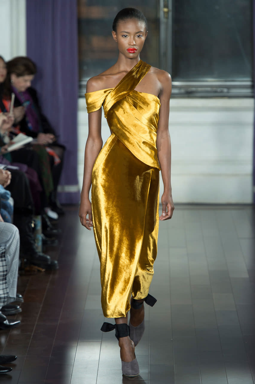 <p>Rich gold velvet one-strap dress from Jason Wu (Photo: Getty Images) </p>