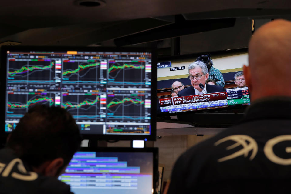 Federal Reserve Chairman Jerome Powell speaks on a television as traders work on the floor of the New York Stock Exchange in New York, U.S., February 27, 2018. REUTERS/Lucas Jackson