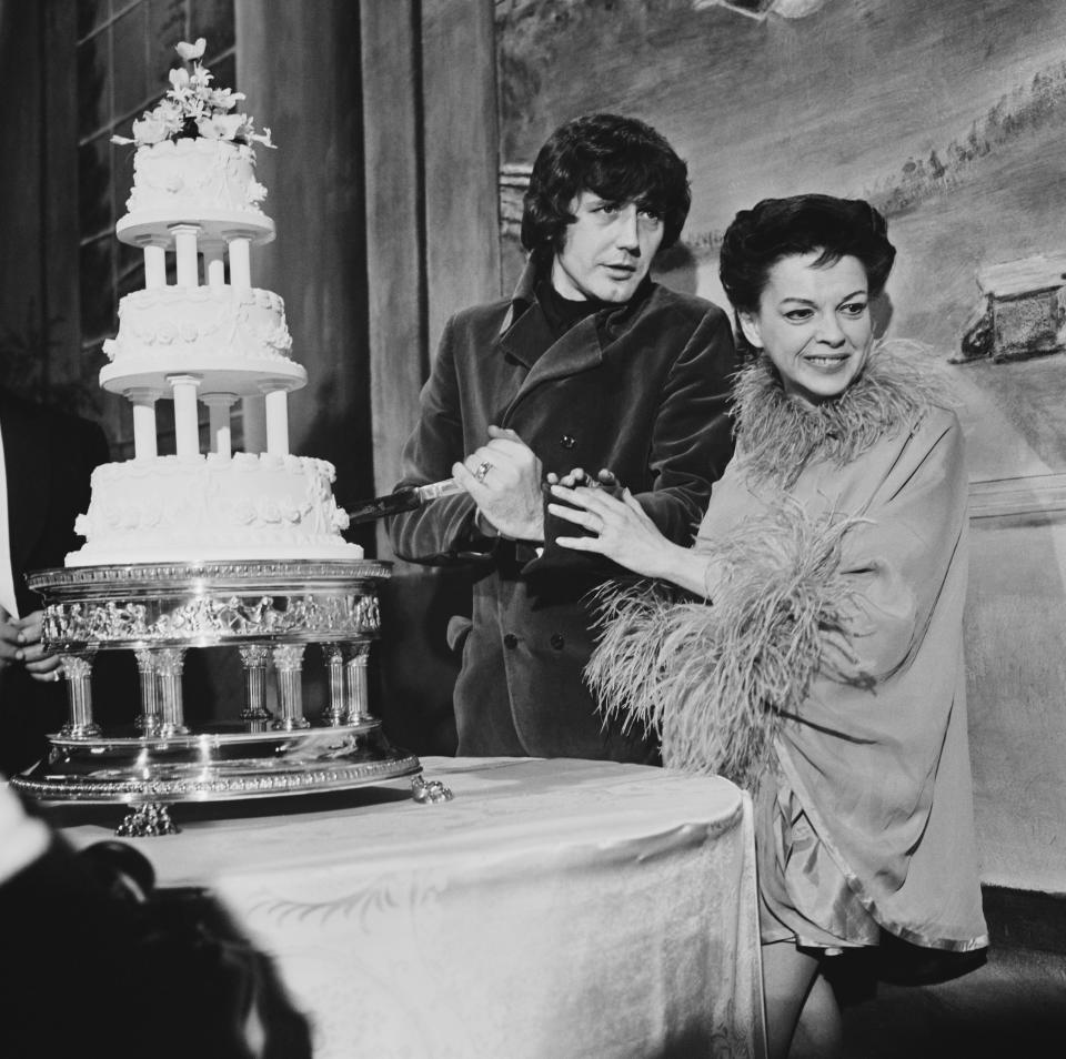 Judy Garland and Mickey Deans cutting their wedding cake, London, UK, March 15, 1969. | Evening Standard—Getty Images