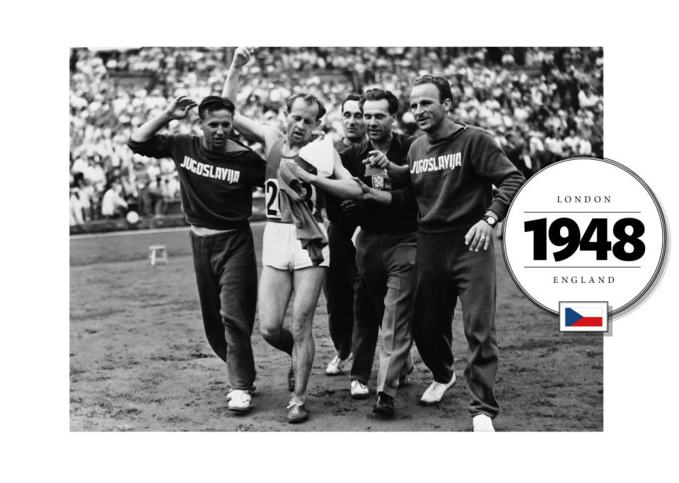 Representing Czechoslovakia Emil Zátopek, a long-distance runner, won many gold medals at both the 1948 and 1952 Summer Olympics. Here, he was photographed in 1948 after a victory, supported by his team in “Jugoslavija” emblazoned sweatsuits. (Getty Images)