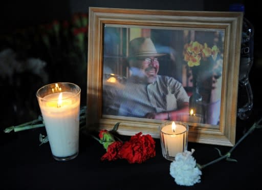 A portrait of slain Mexican journalist Javier Valdez is displayed during a tribute organized by colleagues, relatives and civil organizations in Mexico City on July 15, 2017