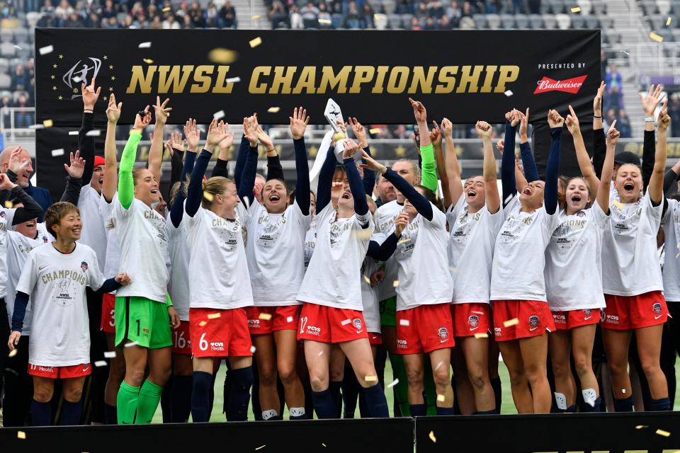 The Washington Spirit celebrate after defeating the Chicago Red Stars in the NWSL Championship match.