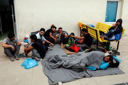 People rest up inside a camp for refugees and migrants in the town of Subotica, Serbia September 29, 2016. REUTERS/Marko Djurica