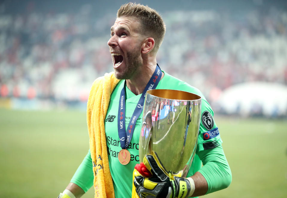 Liverpool's Adrian lifts the trophy during the UEFA Super Cup Final at Besiktas Park, Istanbul. (Photo by Nick Potts/PA Images via Getty Images)