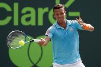 Mar 30, 2017; Miami, FL, USA; Tomas Berdych of the Czech Republic hits a forehand against Roger Federer of Switzerland (not pictured) in a men's singles quarter-final during the 2017 Miami Open at Crandon Park Tennis Center. Federer won 6-2, 3-6, 7-6(6). Mandatory Credit: Geoff Burke-USA TODAY Sports
