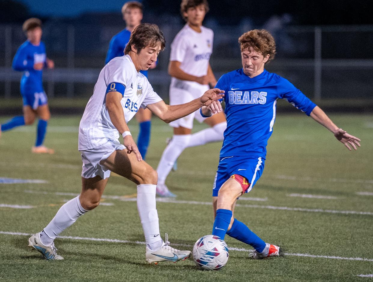 Olentangy's Keegan White, a key defensive player for the Braves, battles Olentangy Berlin's Mason Vinicky on Sept. 14.