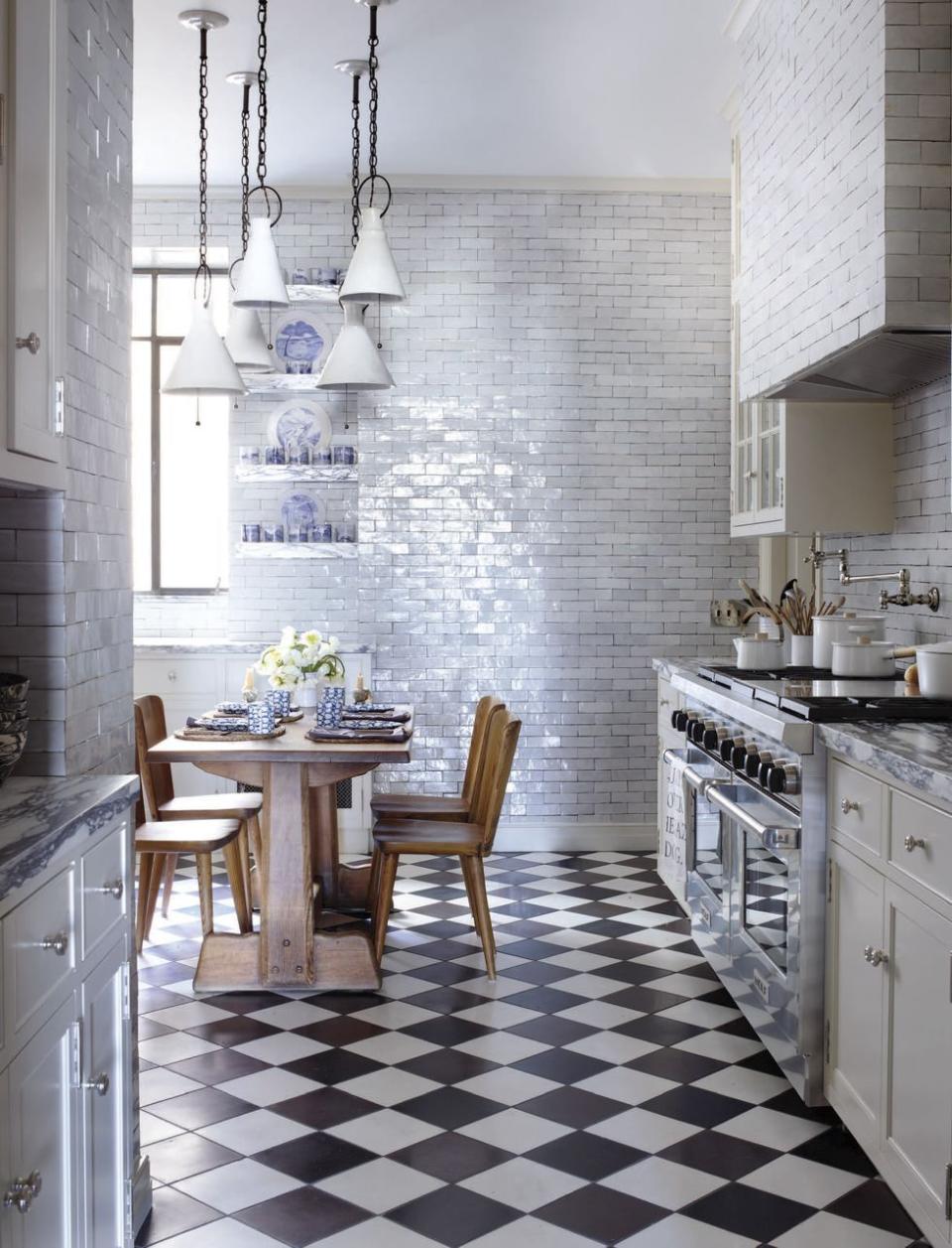 <p>The backsplash and wall tiles by <a href="https://mosaichse.com/" rel="nofollow noopener" target="_blank" data-ylk="slk:Mosaic House;elm:context_link;itc:0;sec:content-canvas" class="link ">Mosaic House</a> give a shiny sheen to this kitchen in <a href="https://www.elledecor.com/design-decorate/house-interiors/a29322601/patricia-greene-isen-manhattan-home/" rel="nofollow noopener" target="_blank" data-ylk="slk:Patricia Greene Isen's Upper East Side home designed;elm:context_link;itc:0;sec:content-canvas" class="link ">Patricia Greene Isen's Upper East Side home designed</a>.</p>