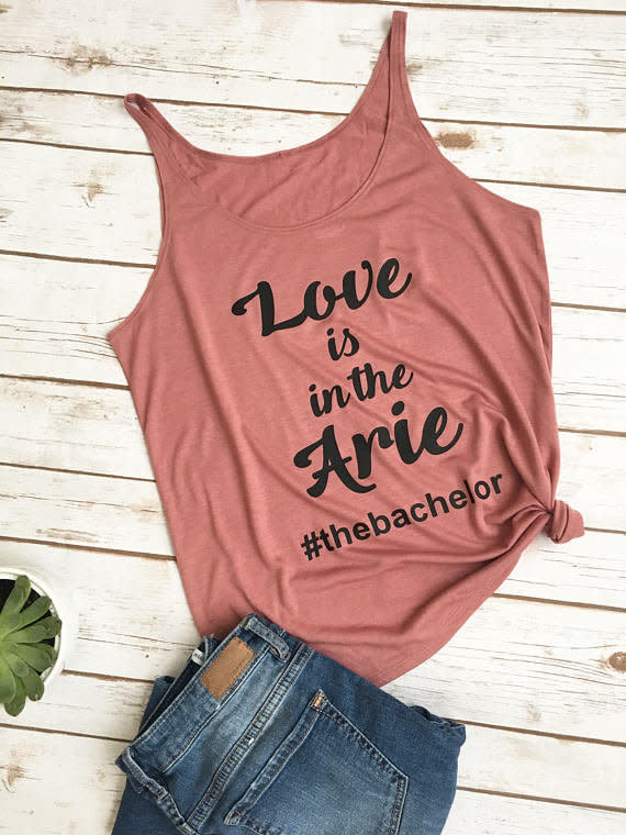 Get it <a href="https://www.etsy.com/listing/570720570/love-is-in-the-arie-the-bachelor?ga_order=most_relevant&amp;ga_search_type=all&amp;ga_view_type=gallery&amp;ga_search_query=bachelor%20show&amp;ref=sr_gallery-1-12" target="_blank">here</a>.