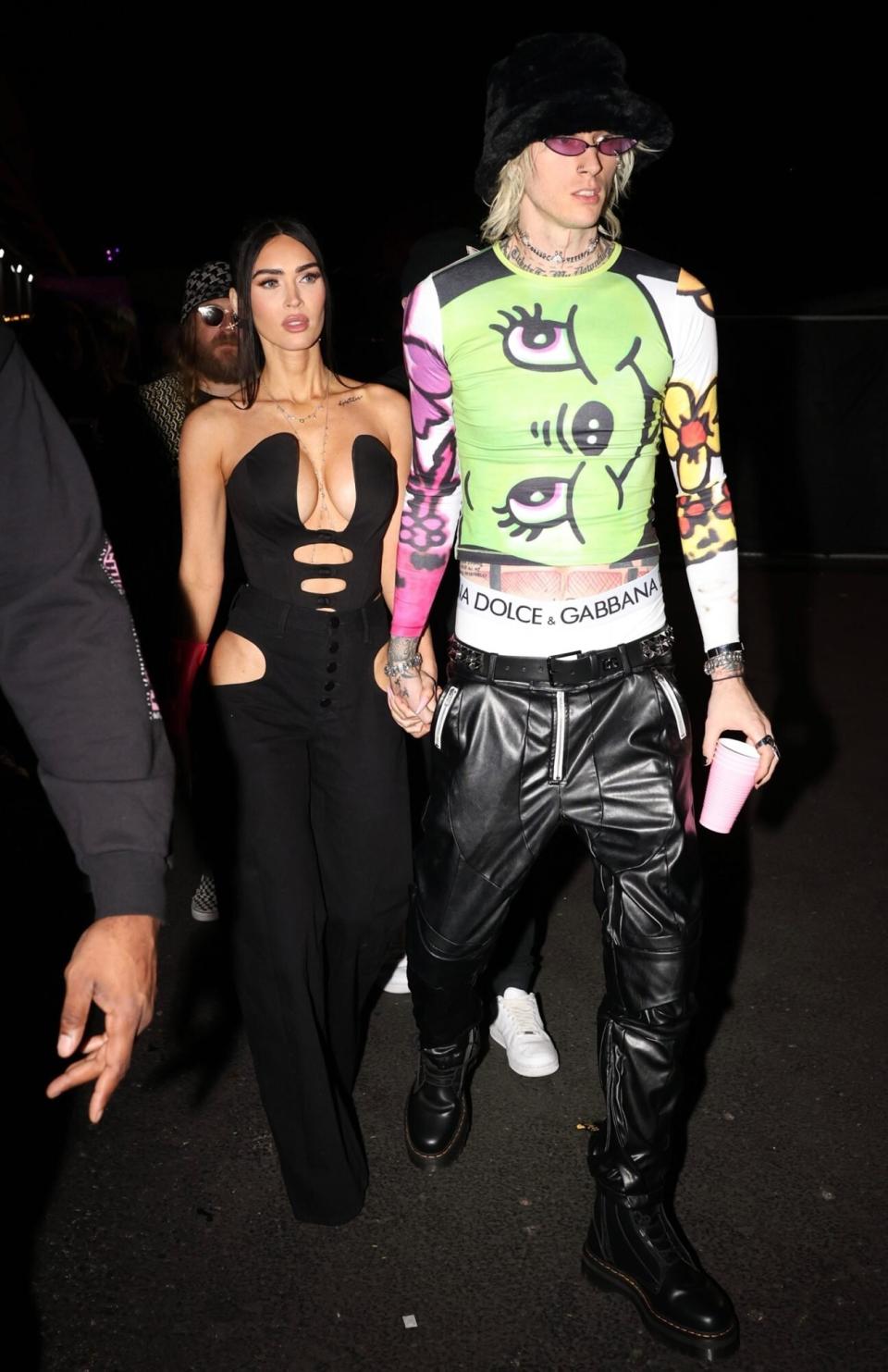 MGK and Megan Fox exit Drake's Super Bowl party at Hanger 1 in Scottsdale ahead of Super Bowl LVII
