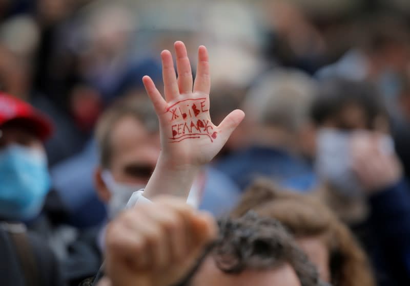 Opposition supporters attend a rally to support their potential candidates in the upcoming presidential election in Minsk