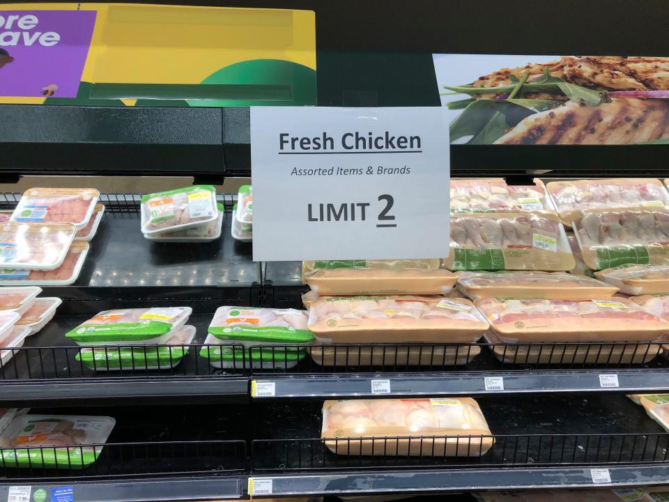 A sign at a Kroger store in Atlanta limits shoppers to two packages of chicken on Tuesday, May 5, 2020. Kroger limited meat purchases, like a number of other grocery retailers, due to supply concerns amid the COVID-19 pandemic.