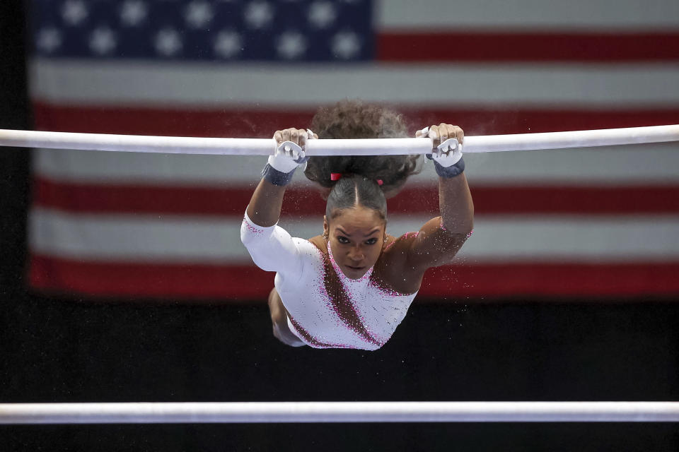 Shilese Jones competes on the uneven bars during the U.S. Gymnastics Championships Friday, Aug. 19, 2022, in Tampa, Fla.(AP Photo/Mike Carlson)