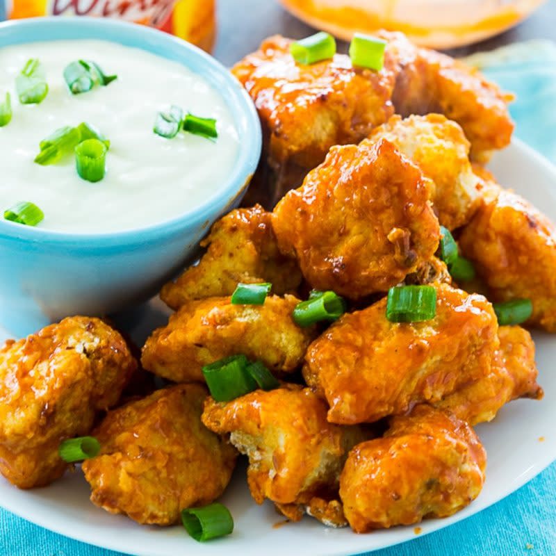 <p>Air fryer buffalo chicken bites cook up super fast in the Air Fryer and have lots of spicy flavor. So easy to make and they taste great dipped in some blue cheese dressing.</p><p><strong>Get the recipe: <a href="https://skinnysouthernrecipes.com/air-fryer-buffalo-chicken-bites/" rel="nofollow noopener" target="_blank" data-ylk="slk:Air Fryer Buffalo Chicken Bites;elm:context_link;itc:0;sec:content-canvas" class="link rapid-noclick-resp">Air Fryer Buffalo Chicken Bites</a></strong></p>