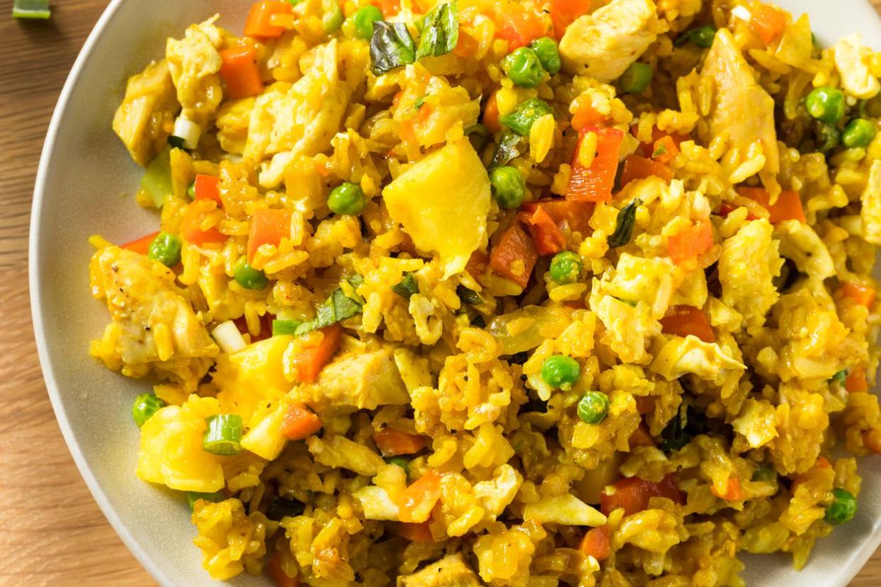 Close up of Pineapple Chicken Fried Rice on white plate