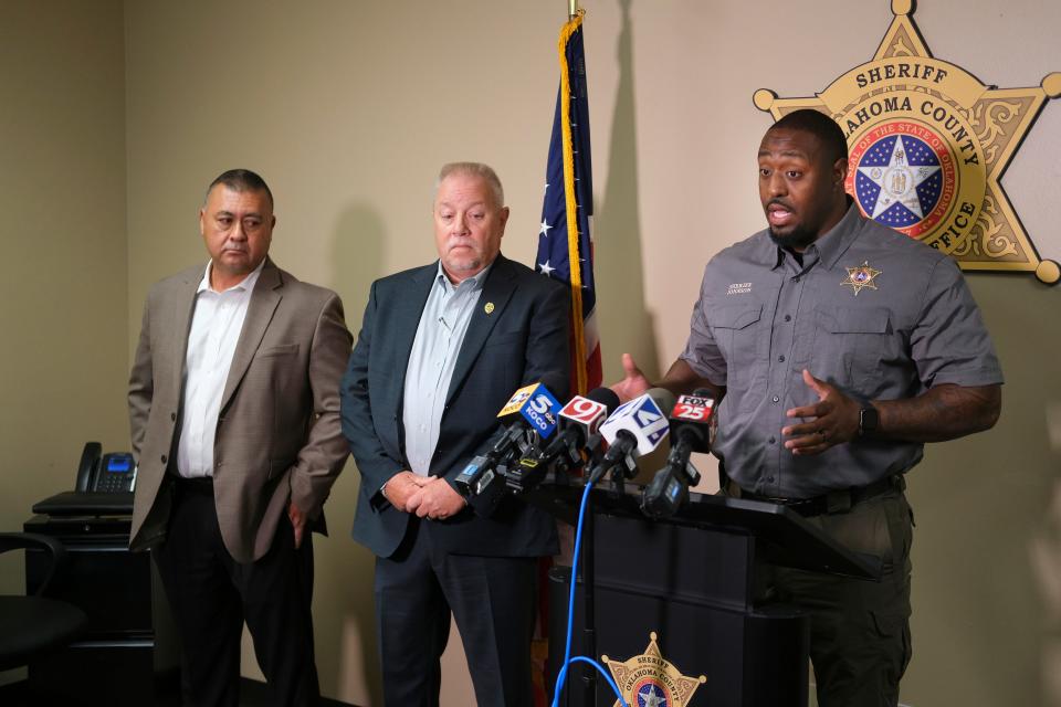 Oklahoma County Sheriff Tommie Johnson, III, right, with Del City Assistant Chief Austin Slayten, left, and Del City Police Chief Lloyd Berger, during a media briefing about the shooting incident at the Del City-Choctaw high school football game Friday night. Monday, Aug. 28, 2023