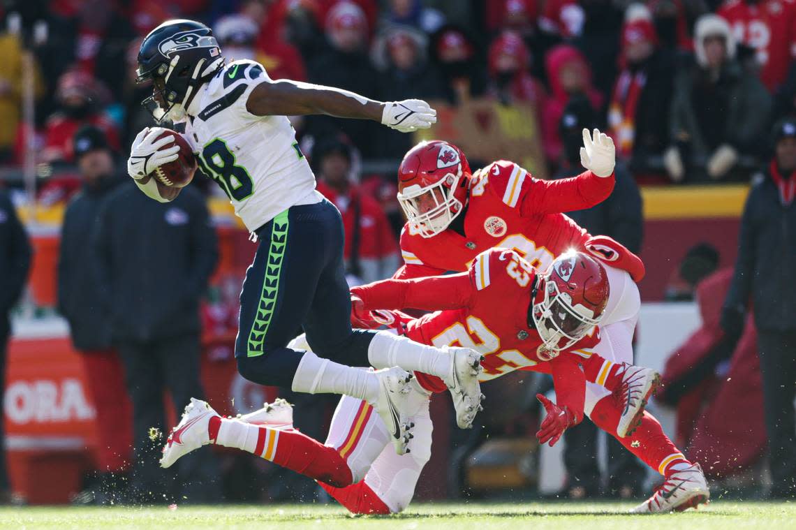 Seattle Seahawks running back Godwin Igwebuike (38) returns a kickoff during the first quarter against the Kansas City Chiefs on Saturday, Dec. 24, 2022, in Kansas City, MO.