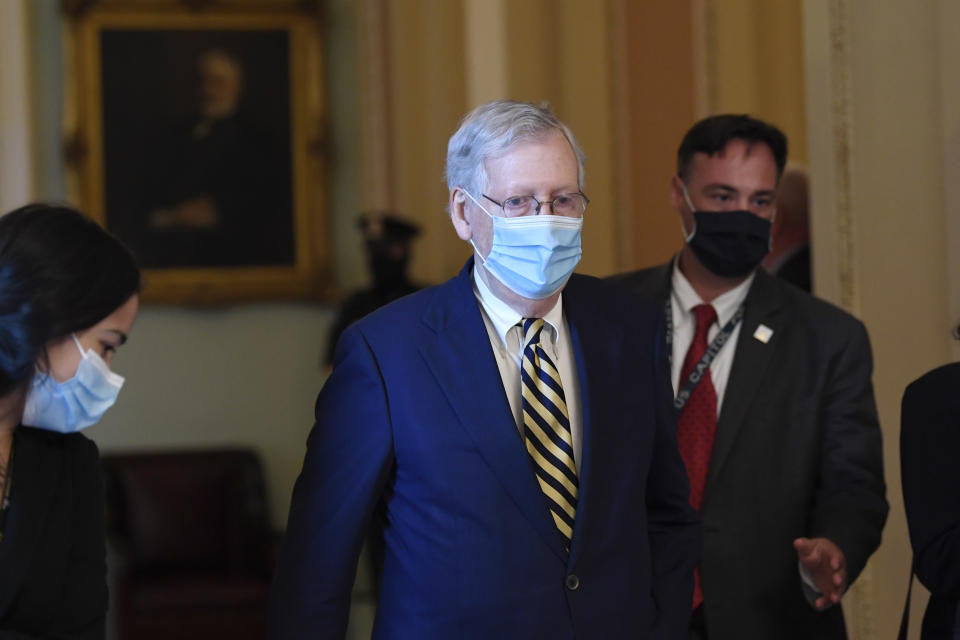 Senate Majority Leader Mitch McConnell of Ky., walks back to his office on Capitol Hill in Washington, Monday, Aug. 3, 2020. (AP Photo/Susan Walsh)