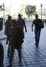 Members of a team of experts from the Organisation for the Prohibition of Chemical Weapons (OPCW) return to their hotel in Damascus October 9, 2013. The head of the Hague-based global chemical weapons watchdog said on Wednesday that Syrian officials had been "quite cooperative" in the early stages of the destruction of Syria's chemical weapons arsenal. Ahmet Uzumcu, director general of the Organisation for the Prohibition of Chemical Weapons, said that international experts aimed to visit 20 sites in the coming days and weeks, and described their mission to eliminate Syria's chemical weapons by mid-2014 as "realistic" if they had international support. (REUTERS/Khaled al-Hariri)