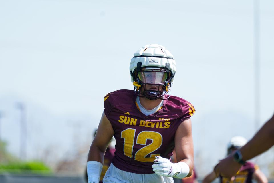 Tight end Jalin Conyers (12) runs through drills at the Sun Devils' first practice of the season at the Kajikawa Practice fields on July 31, 2023, in Tempe.
