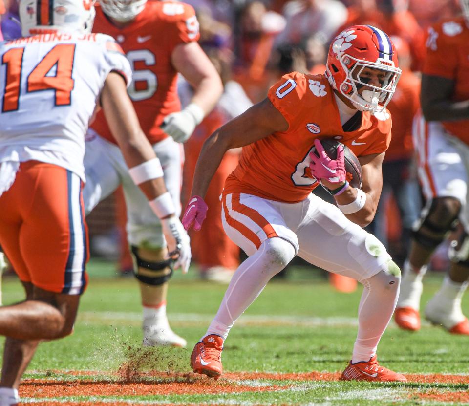 Clemson wide receiver Antonio Williams(0) runs after a catch near Syracuse defensive back Jason Simmons Jr (14) during the second quarter at Memorial Stadium in Clemson, South Carolina Saturday, October 22, 2022.  