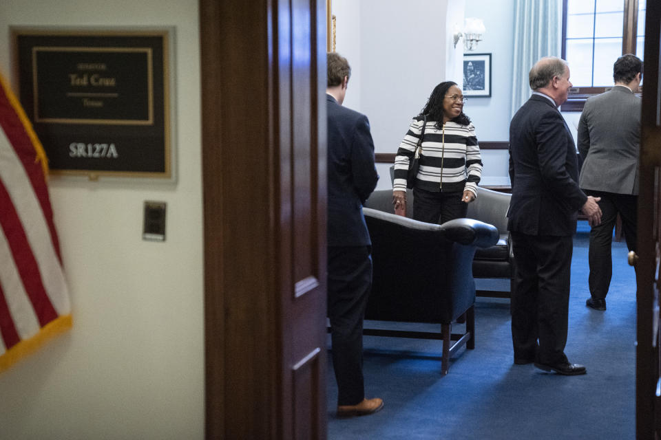 Supreme Court nominee Ketanji Brown Jackson stands in the office of Sen. Ted Cruz, R-Texas, before a meeting on Capitol Hill, Tuesday, March 8, 2022, in Washington. (AP Photo/Evan Vucci)