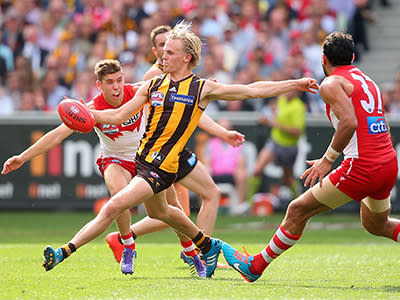 <p>Hawthorn's Will Langford loads up a kick.</p>