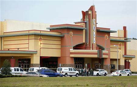 Police tape surrounds the Cobb Grove 16 movie theater in Wesley Chapel, Florida, January 13, 2014. REUTERS/Mike Carlson